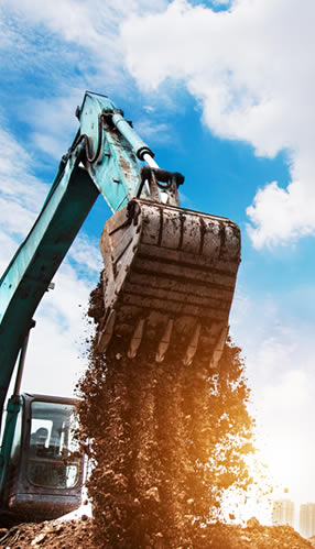 pelleteuse sur chantier en tain de creuser